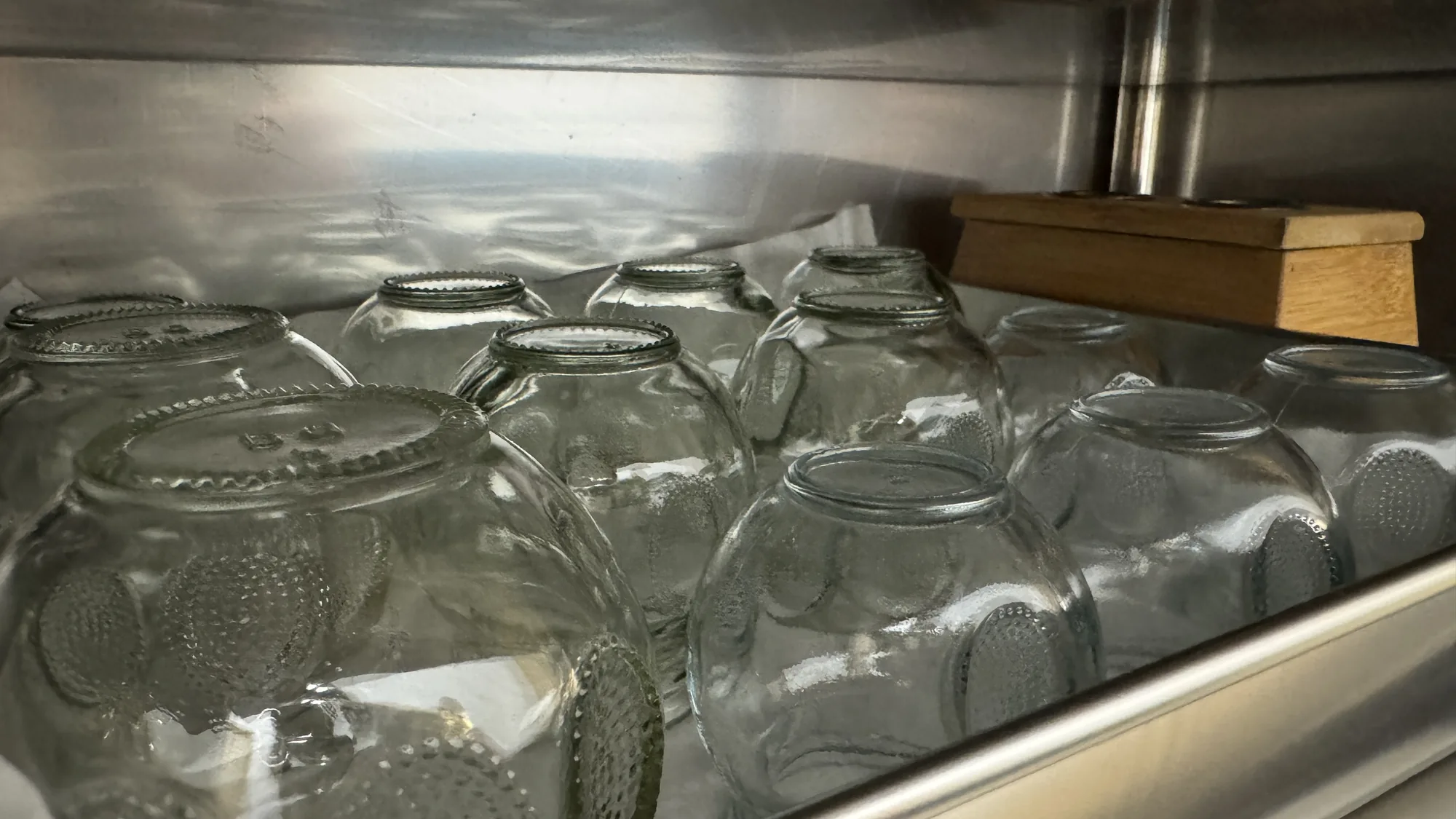 Glass fire-cupping jars on stainless treatment tray